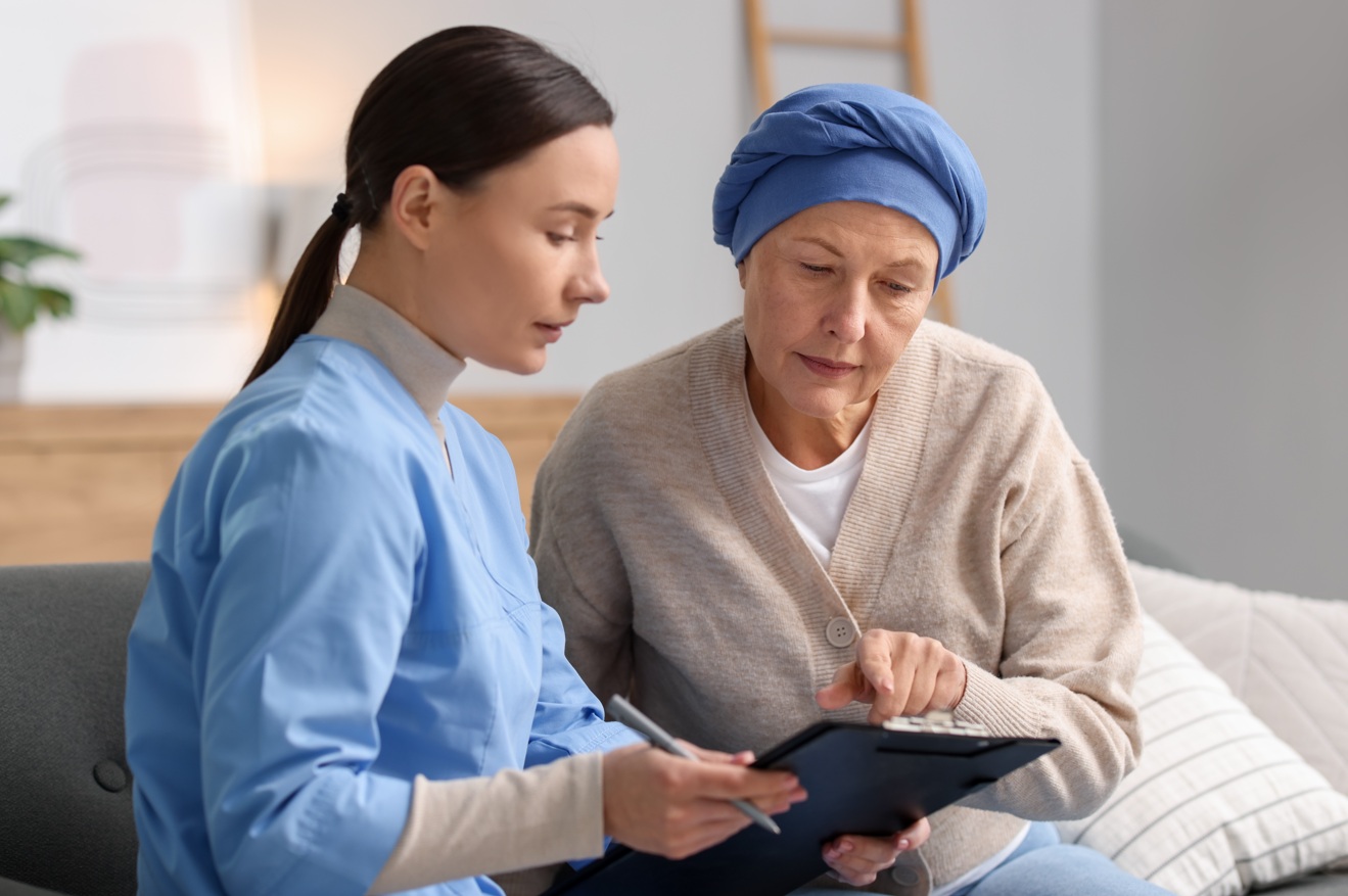 Portable Early Cancer Detection — healthcare professional reviewing results with a patient