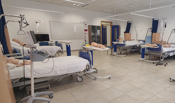 Nursing Lab Initiative — simulation ward with patient mannequins on hospital beds