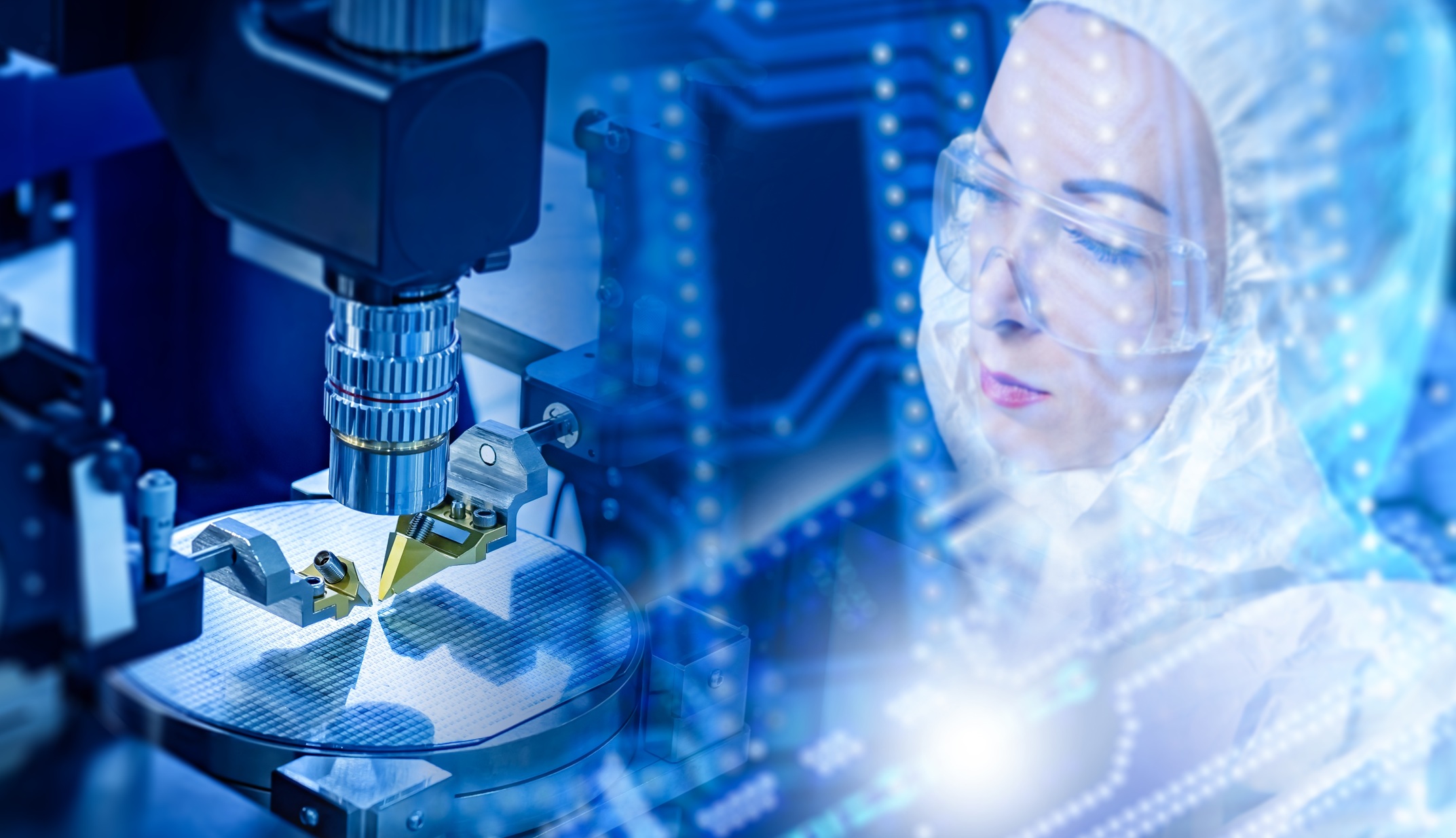 Semiconductor Collaboration — engineer in cleanroom inspecting silicon wafer under microscope